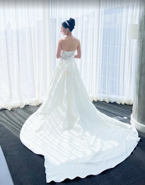 Bride in an altered wedding gown on her wedding day, serving Swansea MA and Eastern Massachusetts