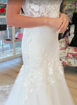 Bride in an altered wedding gown on her wedding day, serving Swansea MA and Eastern Massachusetts