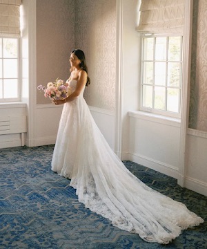 Bride in an altered wedding gown on her wedding day, serving Swansea MA and Eastern Massachusetts